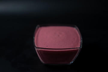 Fruit puree on a black background