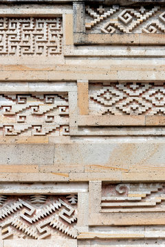 Close up of intricate mosaic fretwork of the geometric patterns called grecas. Mitla, Mexico