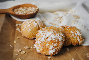 Cookies lie on a white wooden table.