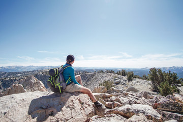 Female Hiker in the mountains looking at a scenic view - 293461766