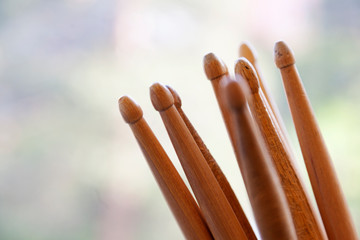 lots of drum sticks in the window