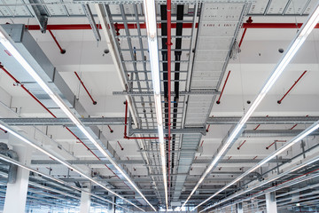 Illuminated ceiling of modern factory warehouse, Stuttgart, Germany