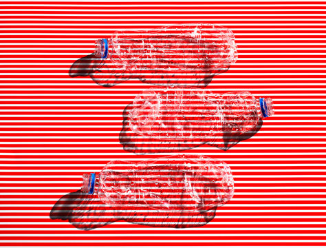 Plastic Bottles On Red White Striped Background