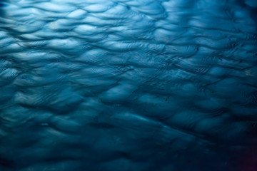 Full frame shot of rippled water in swimming pool at night