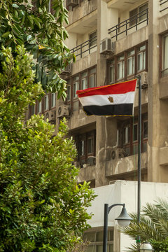 Low angle view of Egyptian flag against building
