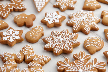 Christmas gingerbread cookies on white planks