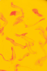 Fototapeta na wymiar Abstract background blur red paint in yellow