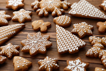 Christmas gingerbread cookies on brown planks