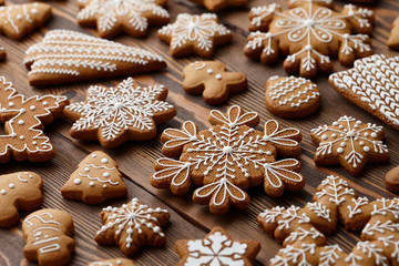 Christmas gingerbread cookies on brown planks