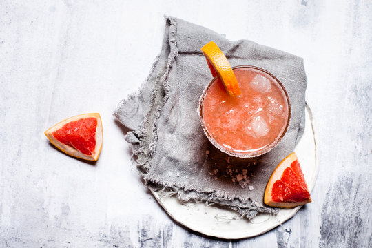 Mexican Paloma cocktail in salt rimmed glass