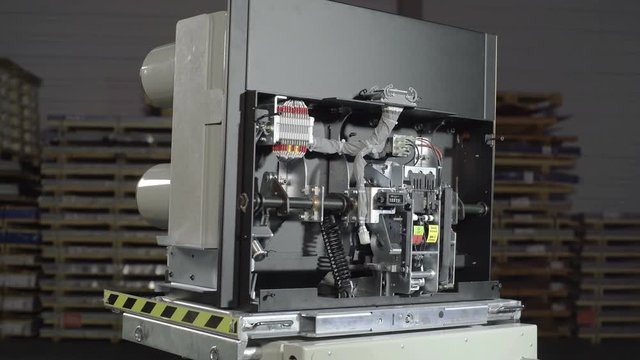Automatic vacuum circuit breaker, fuses in a big industrial electric rack.