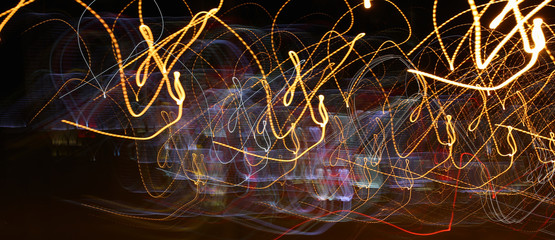 Abstract background lights of a night city as a drunk man sees a driver all moving chaotically depicting loops