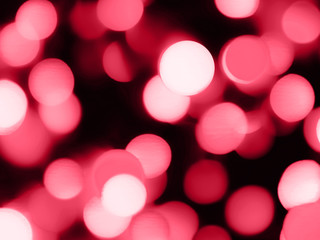 Atmospheric red festive bokeh on a black background