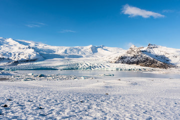 Fototapeta na wymiar Fjallsarlon Iceberg lagoon with Vatnajokull glacier in Iceland