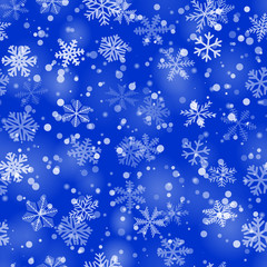Christmas seamless pattern of snowflakes of different shapes, sizes and transparency in blue colors