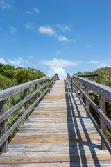 Fototapeta na wymiar Beach Wooden Access and Blue Sky