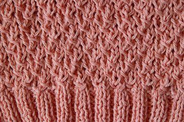 Texture of knitted pink horizontal crocheted canvas with elastic
