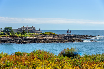 A Three Sail Sailboat Sailing in Front of Walkers Point in Kennebunkport Maine  