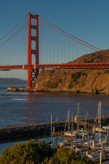 A marina in view of the Golden Gate bridge on a nice sunny morning