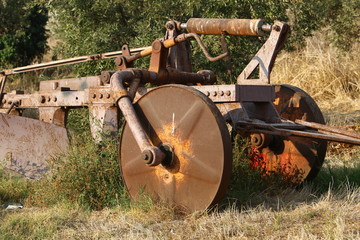 old agricultural machinery stands in a museum in northern Israel