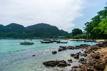 old thai fishing boat on the phi phi don beach