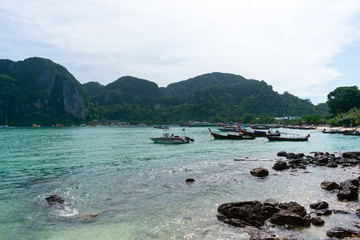 old thai fishing boat on the phi phi don beach