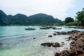 old thai fishing boat on the phi phi don beach