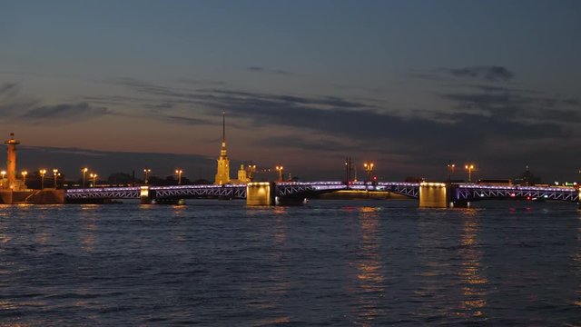 Amazing view of divorce Palace Bridge (Dvortsovy) over Neva River at Saint Petersburg, Russia. White nights in St. Petersburg.