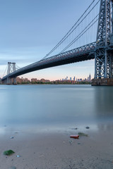 View on Williamsburg Bridge and Midtown Manhattan from East river pier