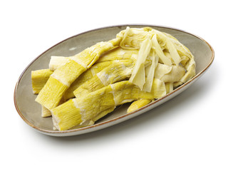 dried bamboo shoot on white background 