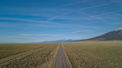 Fototapeta na wymiar Highway to the Sand Dunes showing Mount Blanca on the right