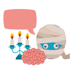 boy with mummy costume talking and candles