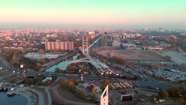 Bridge construction aerial at sunset with traffic. Bucharest Romania