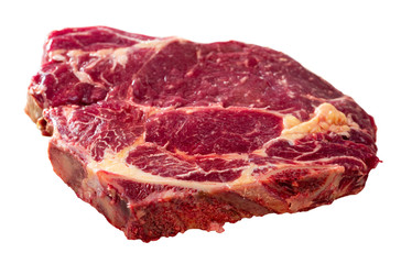Fresh chop of beef on natural wooden background, nobody