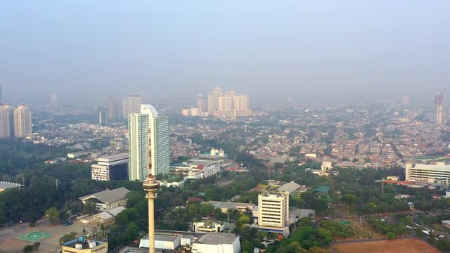 Aerial View of DPR MPR Complex in Jakarta, showing hotel mulia and TVRI tower. Panning Motion
