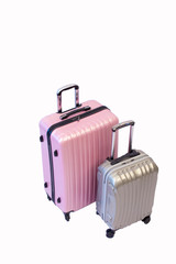 Pink and gray luggage trolley bag side isolated on white background, Compact plastic travel bag with clipping path.