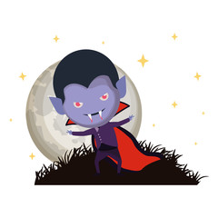cute little boy with dracula costume in dark night scene