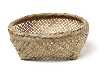 Obraz premium Bamboo basket hand made isolated on white background. Woven from bamboo tray.