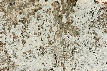 Texture of a concrete wall with cracks and scratches which can be used as a background