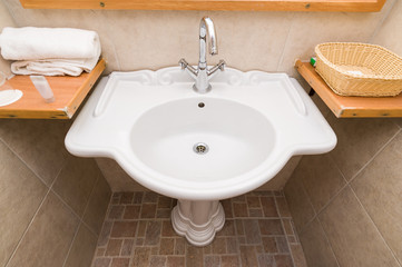 New white hotel bathroom sink