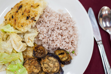 Healthy Bhutanese diet of red unpolished rice with vegetables.