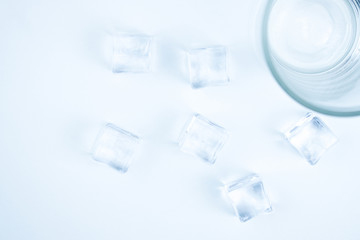 Ice with a glass on a white background.