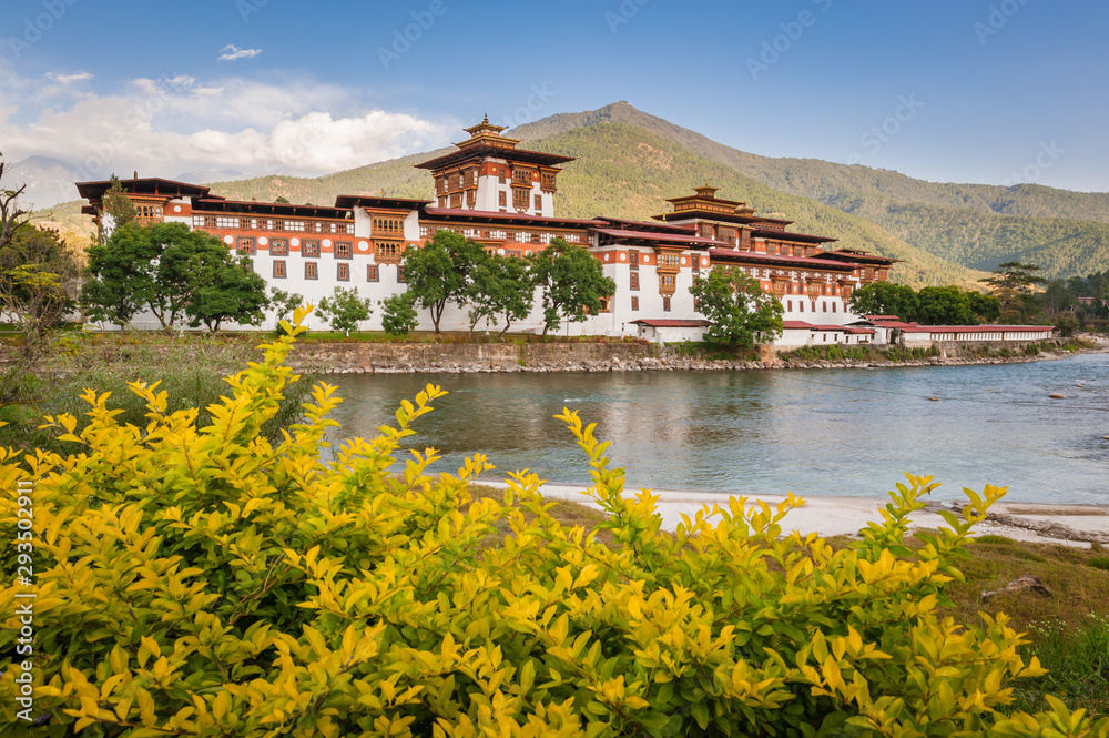 Wall mural historical temple along river side