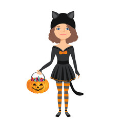 Little girl in halloween black cat costume isolated on white background. Child holds pumpkin basket with sweets. Vector illustration of cute kid character in cartoon simple flat style.