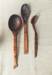 rustic flat lay,wooden rustic spoons on linen background