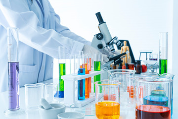 Medical or scientific laboratory researcher performs tests