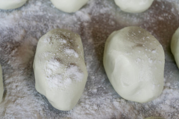 Fototapeta na wymiar The dough that is prepared for baking