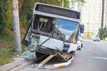 Road accident, accident with a passenger city bus, the bus crashed into a pole