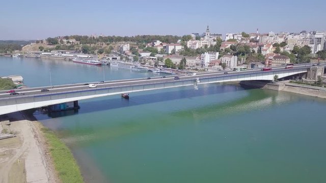 Orbiting 4k aerial shot of Branko bridge and river in Belgrade city centre