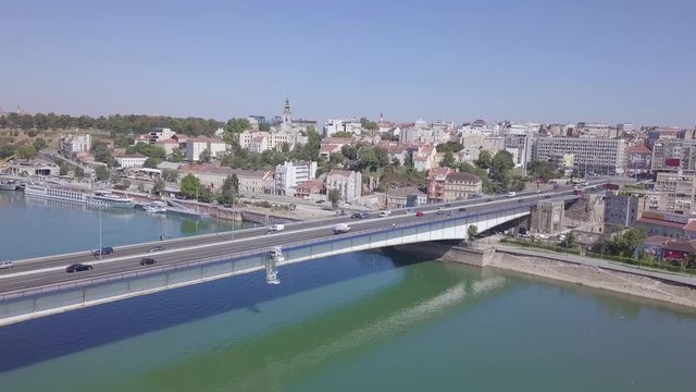Fantastic 4k aerial orbiting shot of Branko bridge, Sava river in Belgrade, summer day
